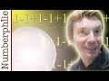Understanding Grandi's Series and Infinite Sums