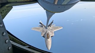 Gas station in the sky refueling F-22 Raptors