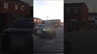 Man arrested after ramming police car with quad bike