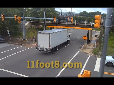 Truck hits 11foot8+bridge88 and almost backs into ambulance
