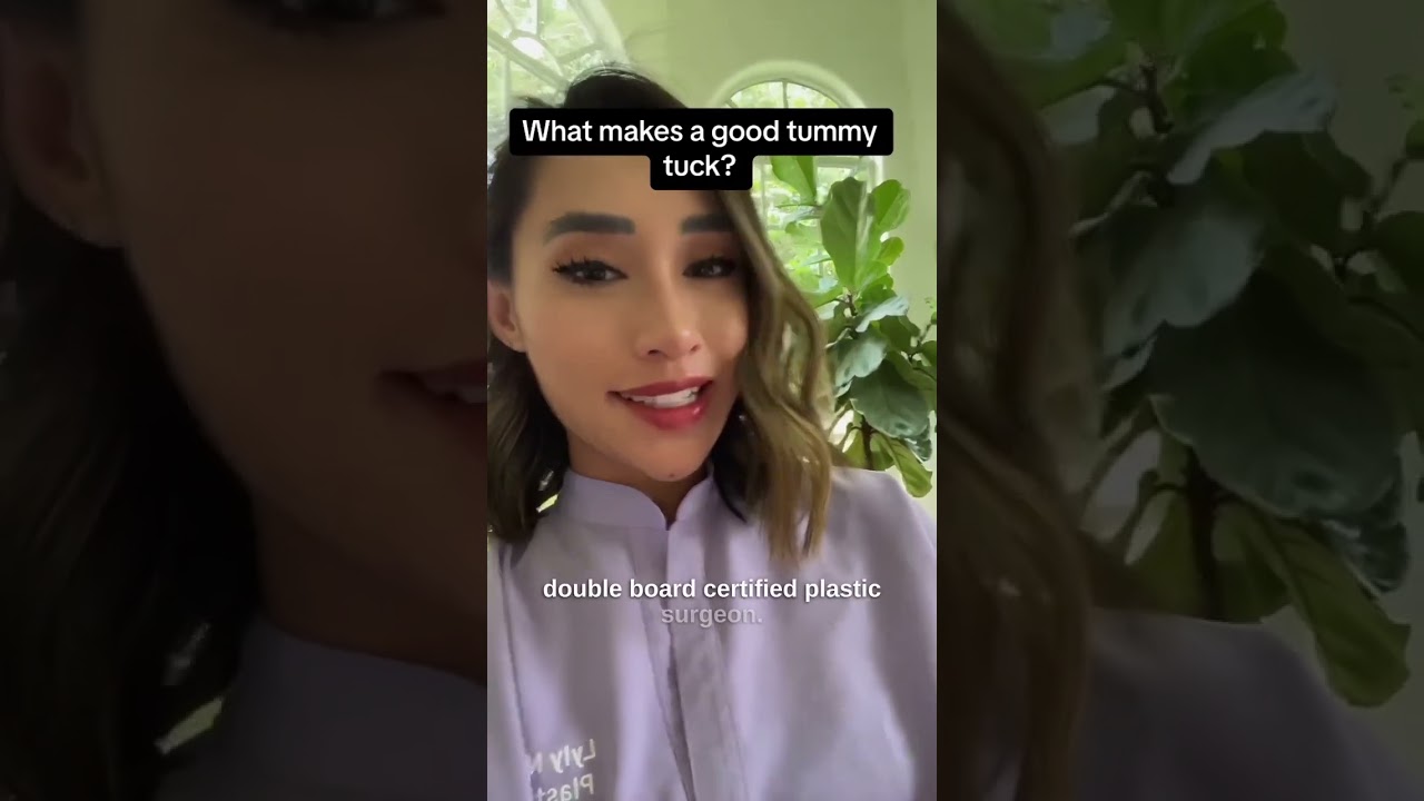 Plastic surgeon discussing tummy tuck benefits.