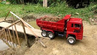 TRUK BERAT ANGKUT TIMBUNAN
