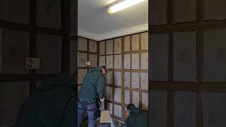 Careful Dismantling of Historic Paneling for Conservation