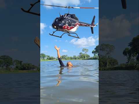 The Helicopter is flyng Over the Village River