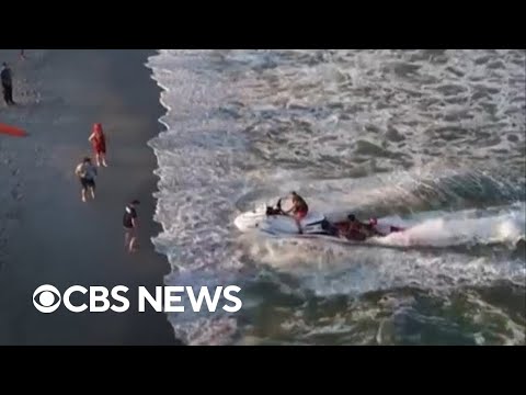 YouTube video thumbnail: Crews on Jet Skis Rescue Swimmers in Distress off New Jersey Coast