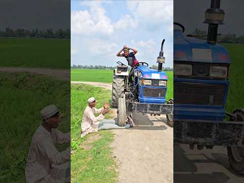 The tractor lifted up on its feet.5