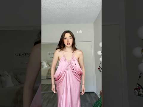 Trying on the "IMPOSSIBLE" dress.