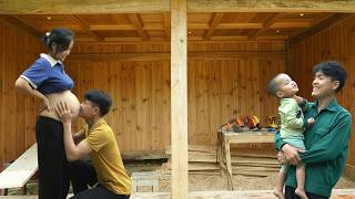 Building wooden walls for the new house - wife and children tremble with fear before the big storm.