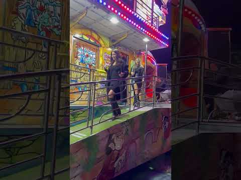 Woman Slips While Exiting Amusement Park Ride After Being Startled by Unexpected Air Compression