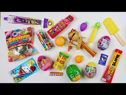 Mixing crazy candy, opening toy candy dispensers Pikmi Pops, Barbie, MLP surprise eggs, slime candy