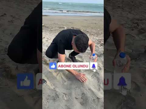 Yunus kral kumsalda kumdan şekil çıkartma deneyi