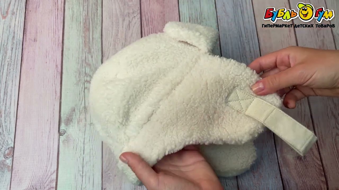 Шапка зимняя с меховой текстурой кремового цвета - видео Шапка зимняя с меховой текстурой кремового цвета - видео