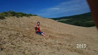 Dad and I doing "flips" at sleeping bear dunes.