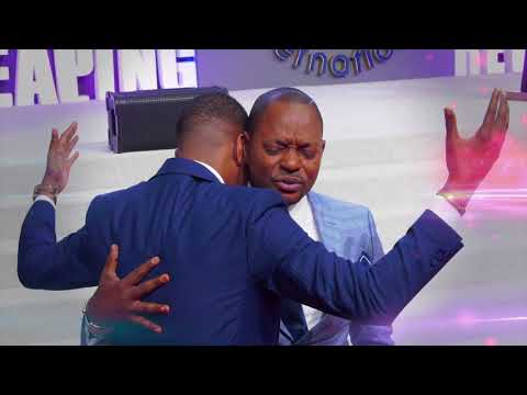 Prophet JOEL FRANCIS TATU receives an impartation from his spiritual father Pastor ALPH LUKAU
