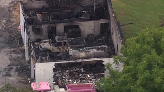 AERIALS:  Vine Grove Fire Department equipment heavily damaged in fire