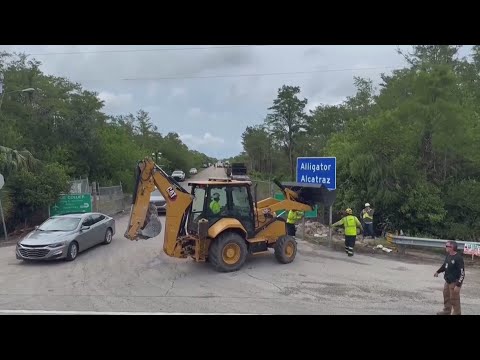 YouTube video thumbnail: Judge Orders Temporary Halt to Construction at Florida's 'Alligator Alcatraz' Detention Center