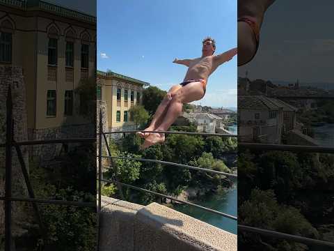 cliff diver hits bridge railing during take-off 😱 part 1 #shorts