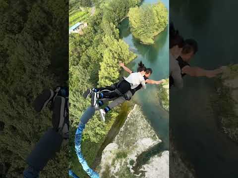 A lovely couple bungee jumping & playing on the world's greatest playing field in world