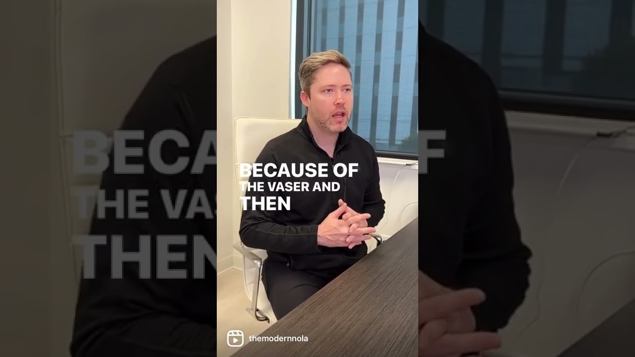 Person discussing VASER technique in office setting.