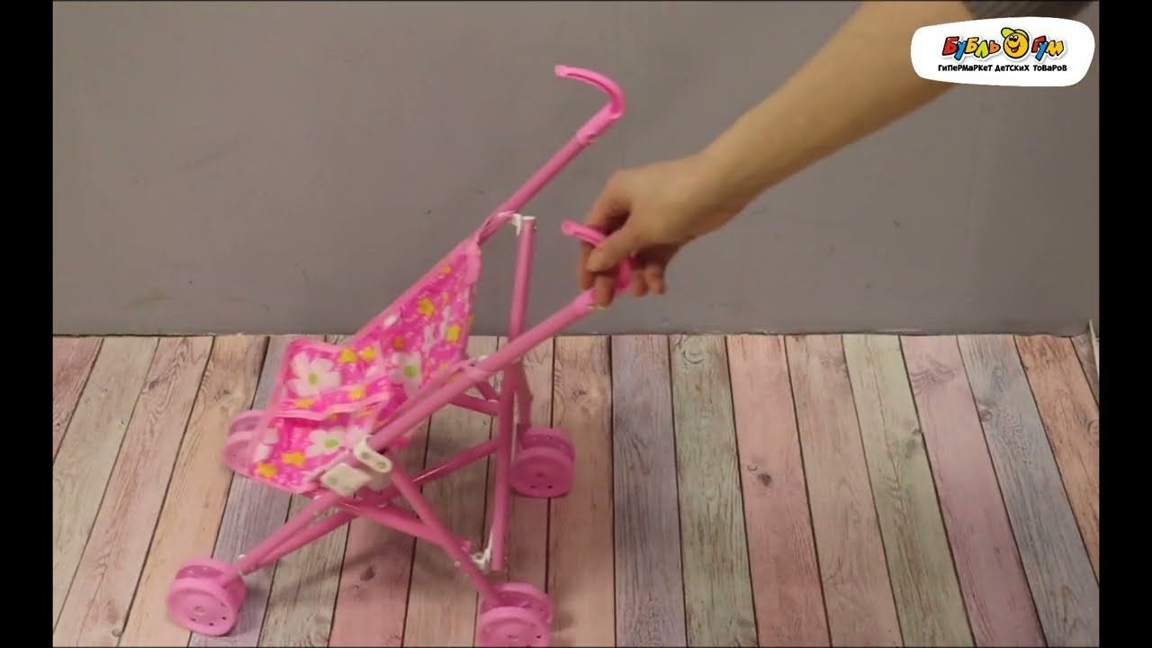 Коляска-трость для пупса розовая - видео Коляска-трость для пупса розовая - видео
