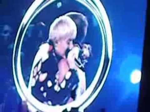 Miley Cyrus DISSES Liam Hemsworth, Admits To Being Gay, & Gets Snuggly On Stage With Stripper-Prom Boy! See The Scandalous Vid HERE!