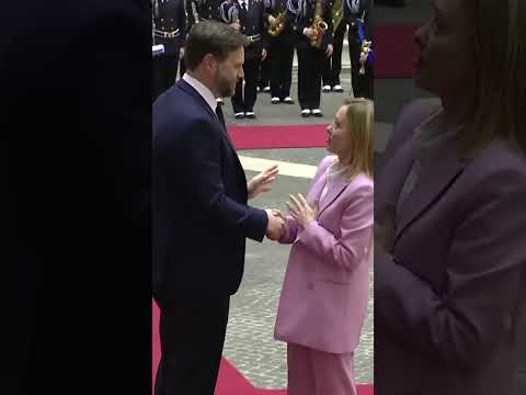 JD Vance greets Italian Prime Minister Giorgia Meloni today in Rome