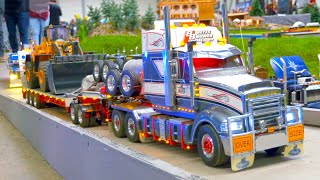EXTRA LONG RC TRUCK ACTION AT GERMANY, RC CAR FAIR AND RC DUMP TRUCKS IN THE MUD