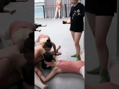 Students doing dance flexibility training