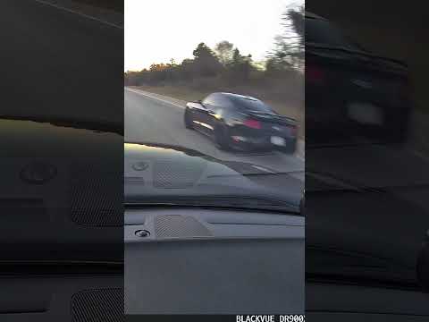 Charger Scatpack 392 gets *SMOKED* by 3 Mustang GT’s on the highway 🔥…. #shorts