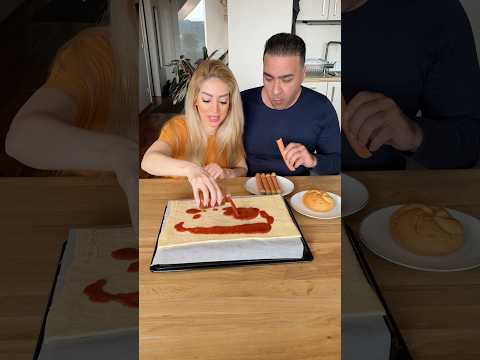 He hides hotdogs into the Pizza#food