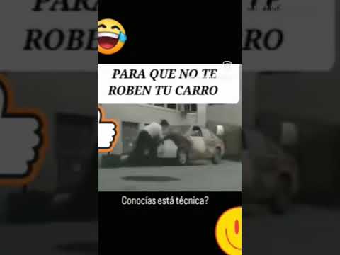 Cuidando su carro de los ladrones que andan en las calles ???
