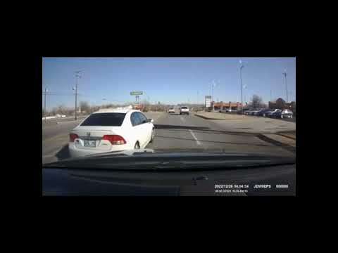 Idiot goes straight in left only lane
