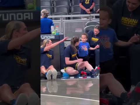 Caitlin with Fever assistant coach Karima Christmas-Kelly's son