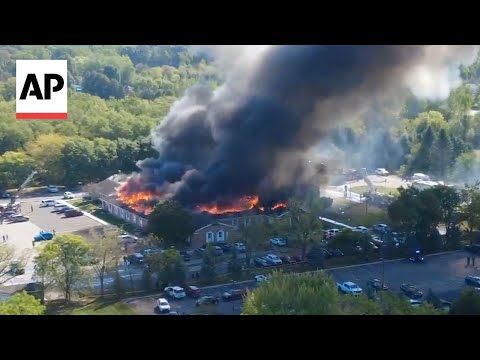YouTube video thumbnail: Fire Engulfs Michigan Church as Police Respond to Shooting