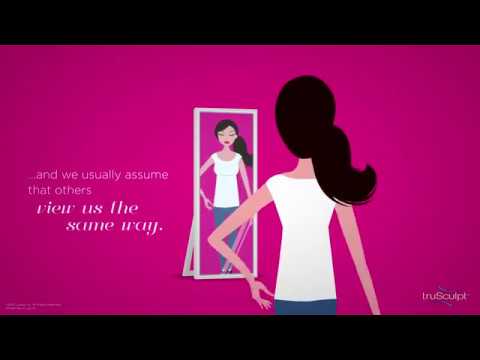 Woman admiring reflection in mirror, thoughtful moment.