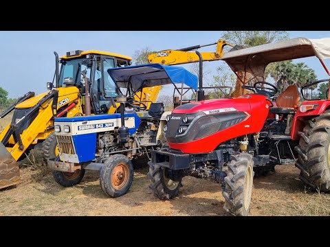 Jcb 3dx Backhoe Loader Machine Loading Red Mud In Mahindra 4WD Tractor With Swaraj Tractor | JCB