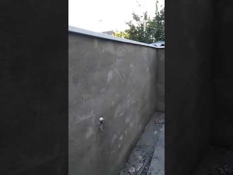 סרטון: בניית חומה סביב בית פרטי,