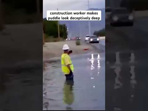 Construction worker makes puddle look deceptively deep