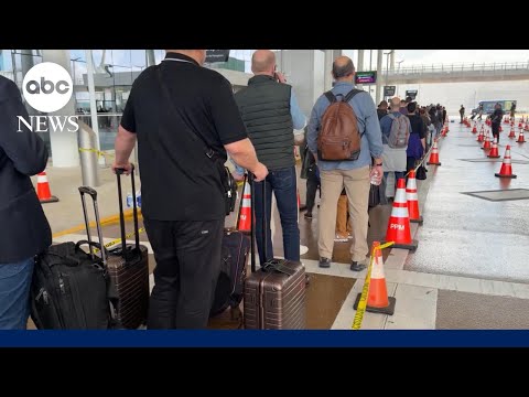 YouTube video thumbnail: Record-Long Wait Times Stretch TSA Officers Amid Travel Surge, Partial Shutdown