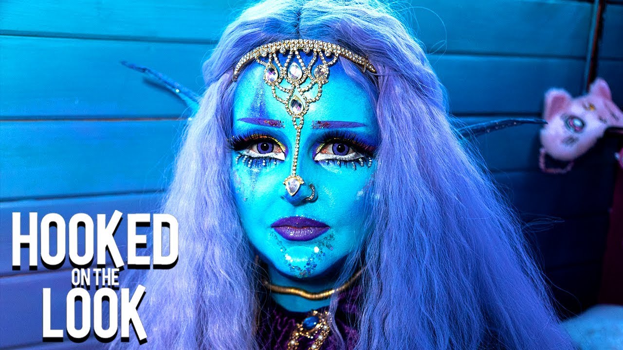 'alien' girl wants to be permanently blue - hooked on the look