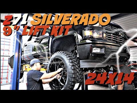 z71 SILVERADO WITH A 9" LIFT KIT on 24x14 Xtreme Force Wheels and 37” tires