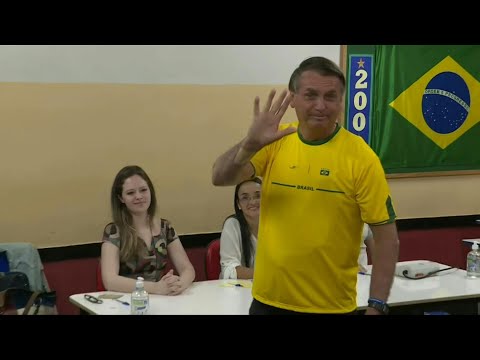 Brazil incumbent Bolsonaro votes in presidential election | AFP