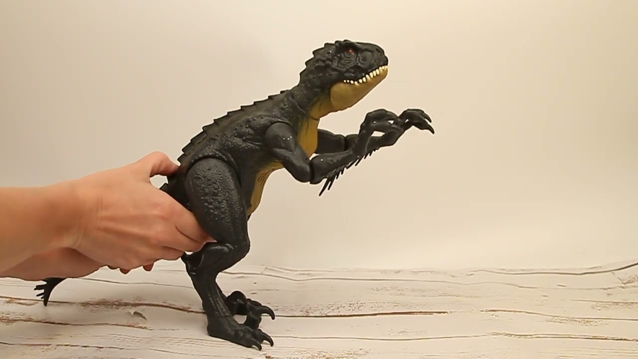 Фигурка JURASSIC WORLD Хлопающий Скорпиос Рекс - видео Фигурка JURASSIC WORLD Хлопающий Скорпиос Рекс - видео