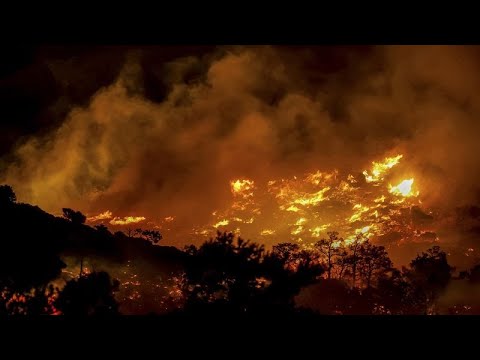 YouTube video thumbnail: Wildfire on the Greek Island of Crete Causes Evacuations of Hotels and Homes