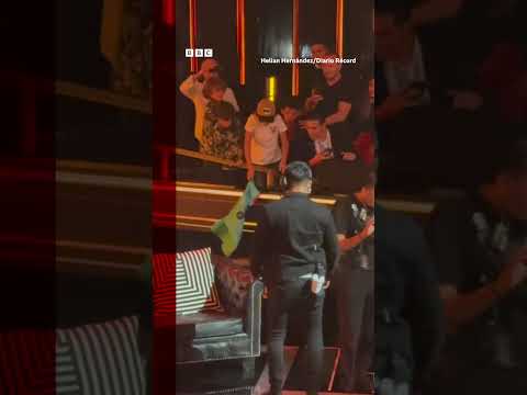 Shakira's ex and former footballer Gerard Pique falls off stage at event. #GerardPique #BBCNews