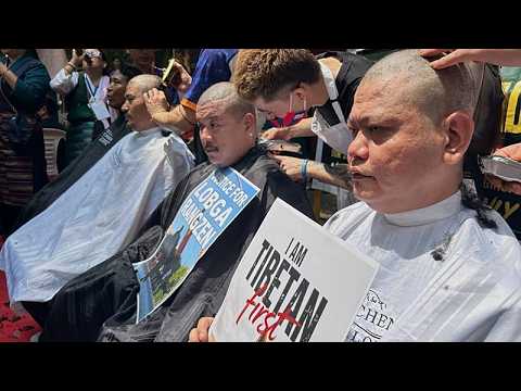 Tibetan protesters in New Dehli denounce China with shaved heads and prayers