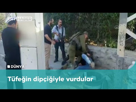 İsrail askerleri Filistinli genci darbetti