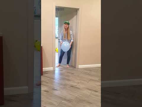 Tanya brings to a funny doggie a blue balloon