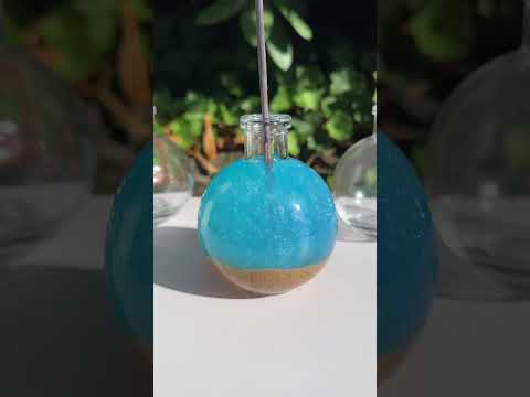 Help me design a new Mermaid Tears potion bottle! Which do you prefer?