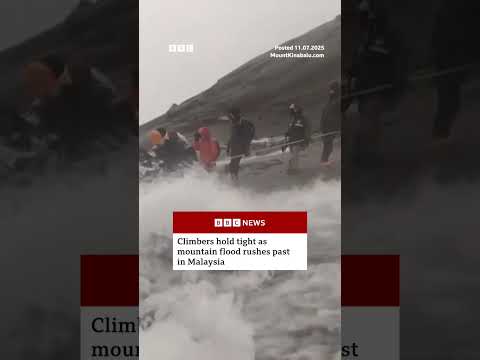 Climbers were forced to pass through fast-flowing water on Malaysia's Mount Kinabalu. #BBCNews